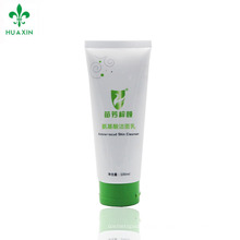 Plastic laminated cosmetic skin cleanser tube with flip top cap